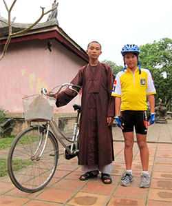 Boy bike touring in Hue, Vietnam